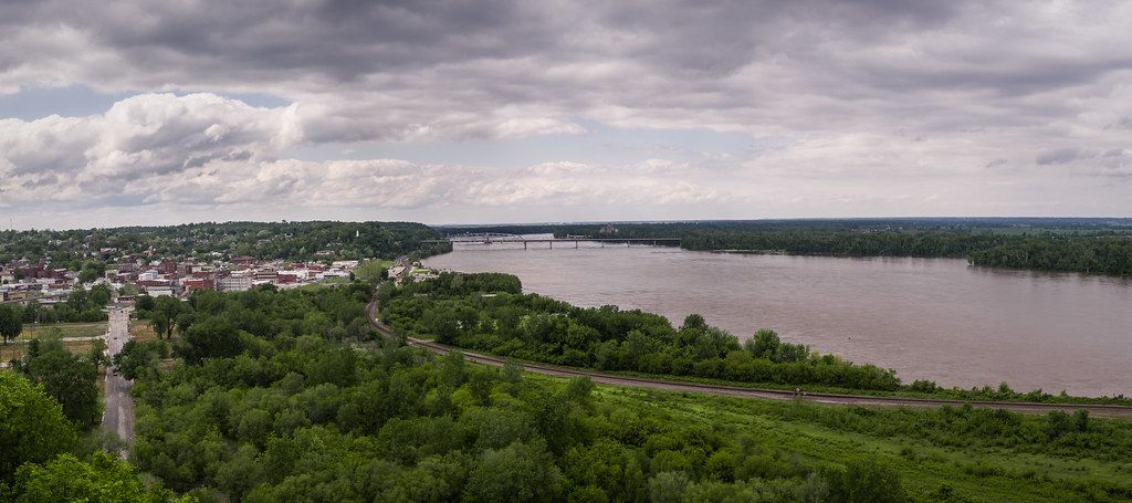 View from Lover's Leap over Hannibal, the tree canopy, and the Mississippi River bridge
